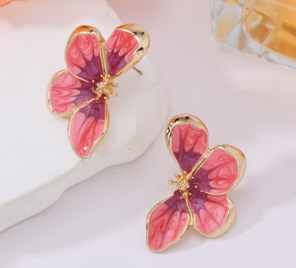 A Pair Of Butterfly-shaped Earrings